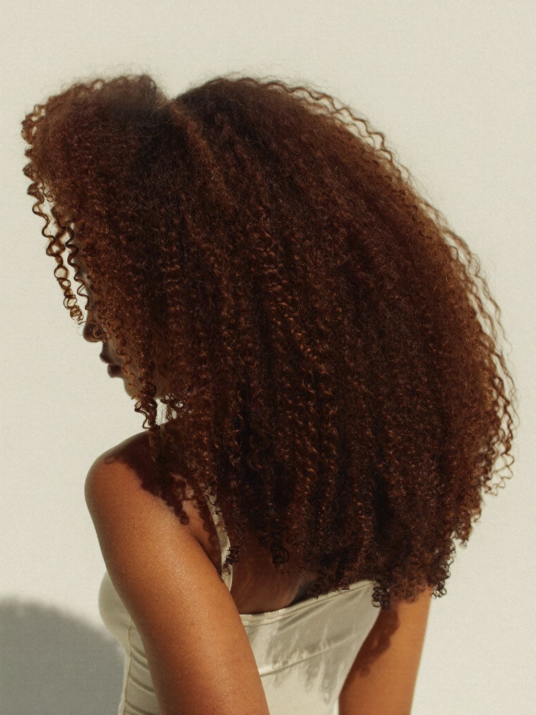 Curls without definition hair, treated with Kérastase Curl Manifesto